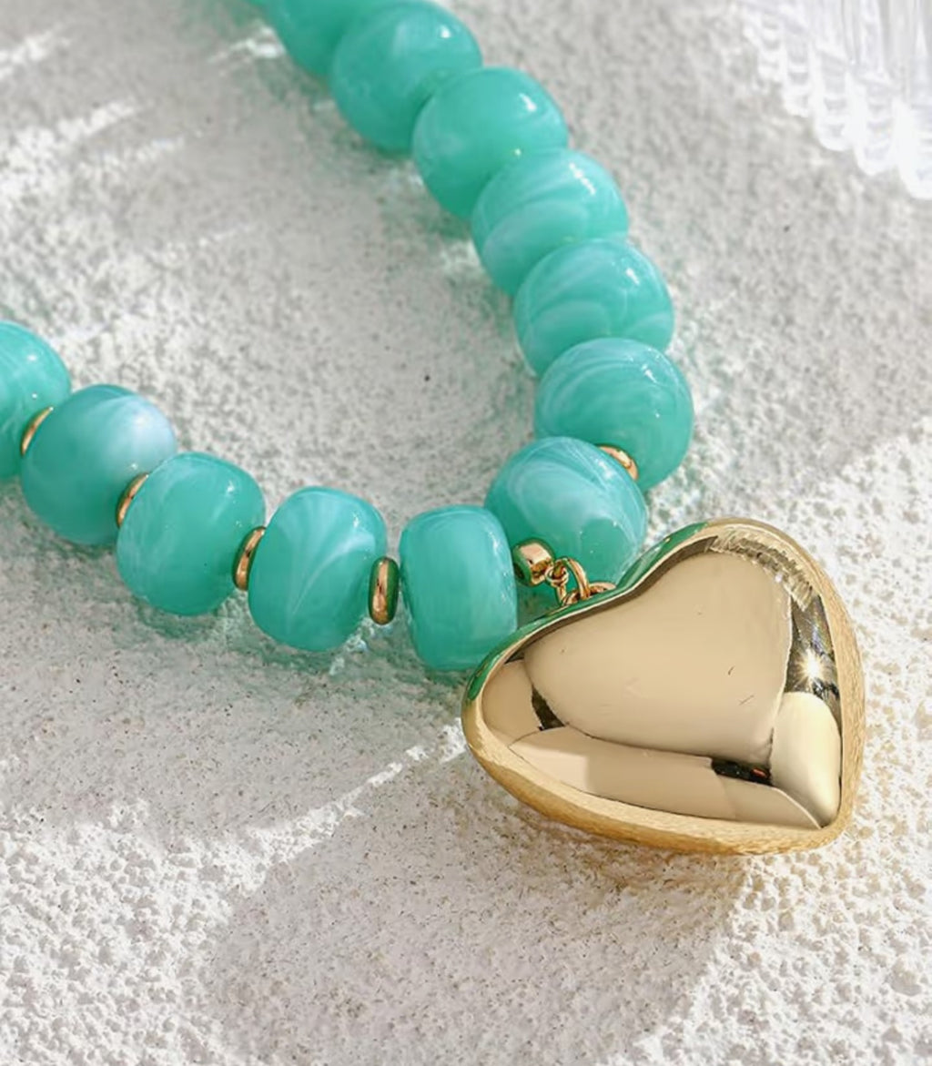 Vibrant Turquoise Beaded Necklace with Gold Heart Pendant